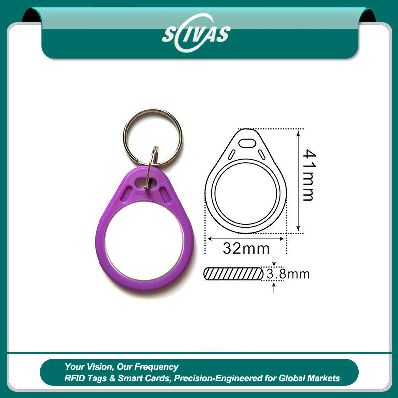 A clear front view of a blue ZT-SJZ-7 ABS RFID key fob demonstrating its ergonomic water drop shape and secure split ring hole.